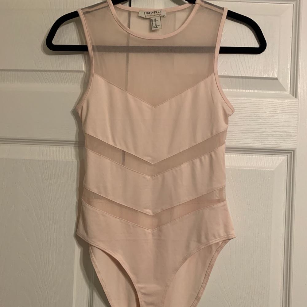 Light pink bodysuit top.